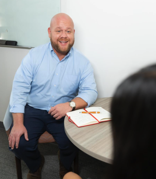 advisor talking with student