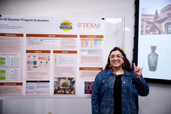 graduate student with research 