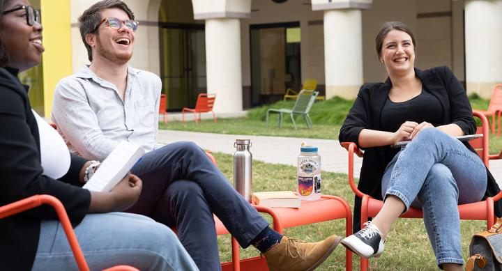 students talking outside