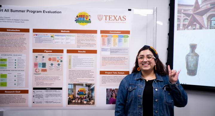 graduate student with research 