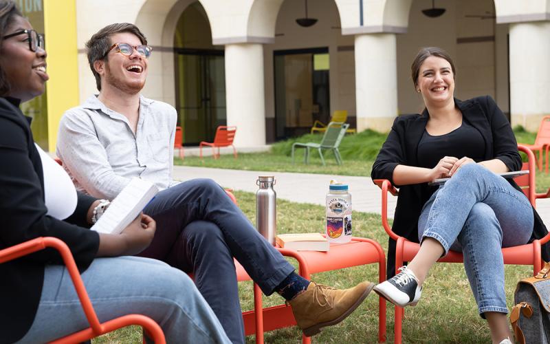 students talking outside