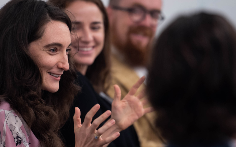 Students talking with hands